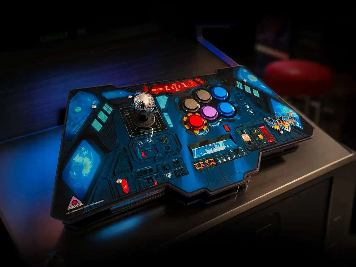 Le contrôleur arcade YK-IIA Arcade Controller pour Earthion, avec sa manette de style cockpit bleue et ses boutons colorés