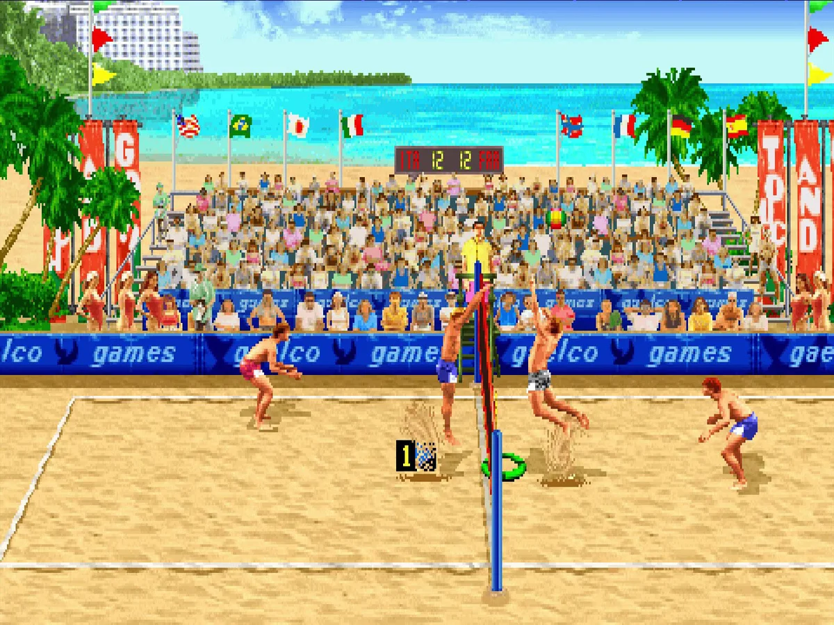 Capture : un match de beach-volley à deux contre deux sur une plage, devant une tribune pleine