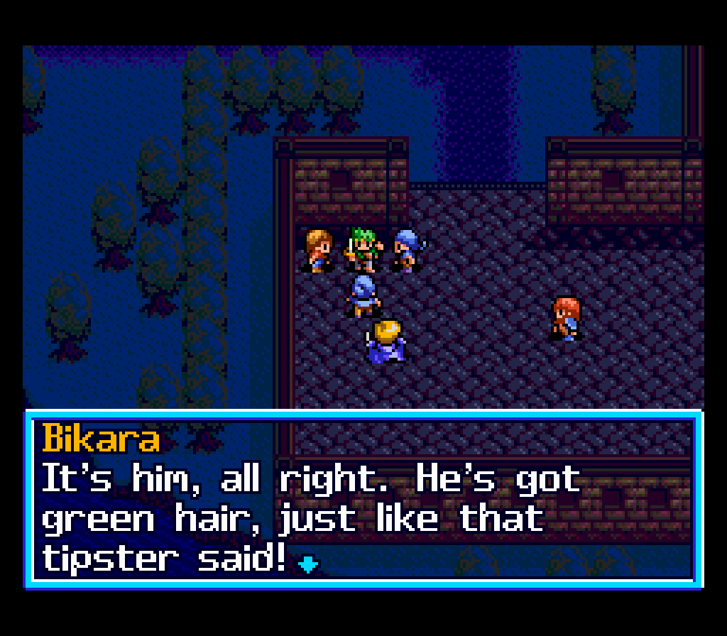 Capture de The Legend of Xanadu en anglais, en vue de dessus : un groupe de personnages dans une ville, et une boîte de dialogue au nom de Bikara