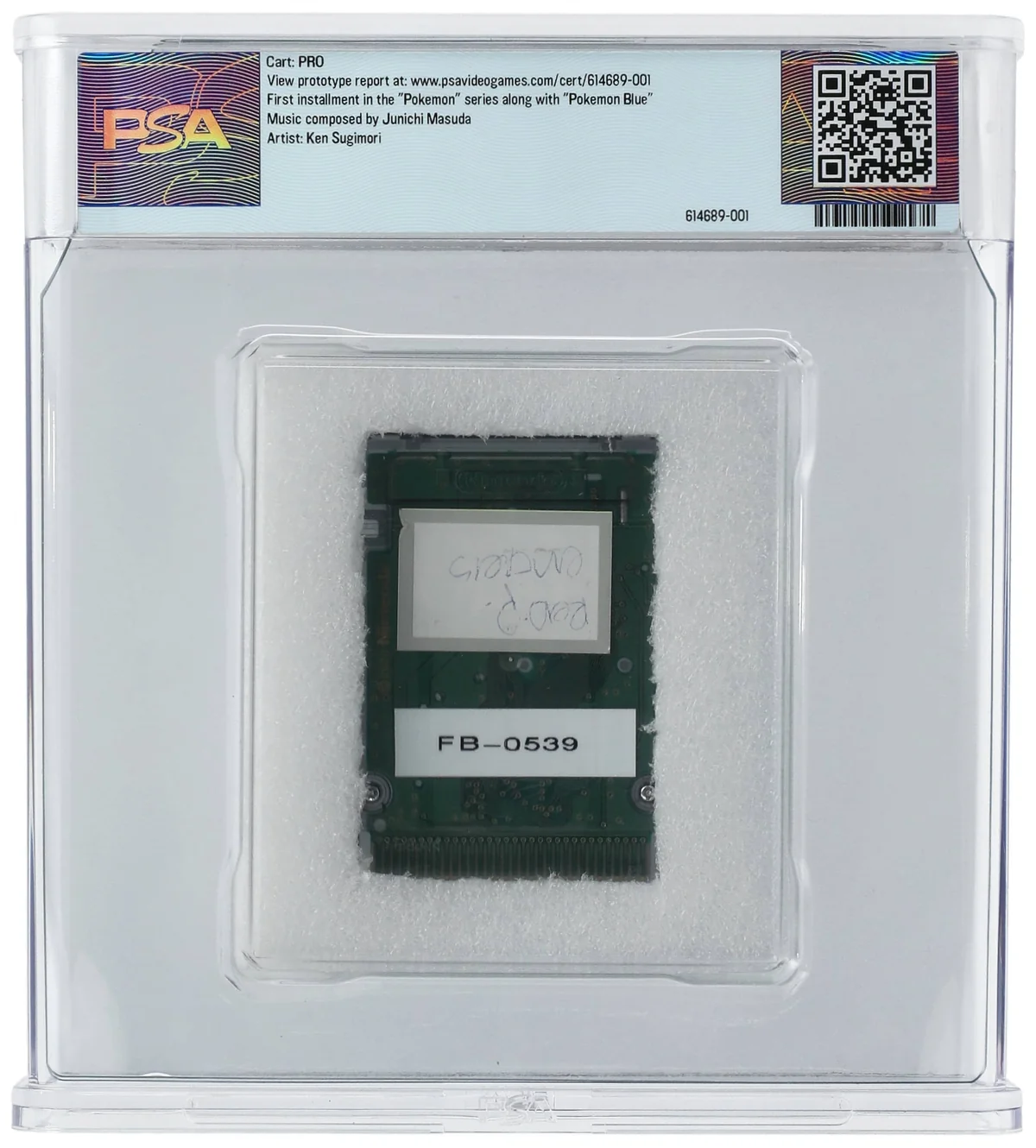 Le dos de la cartouche dans le boîtier PSA : un circuit imprimé vert avec une étiquette manuscrite au stylo bleu et une étiquette blanche FB-0539, sous une étiquette PSA qui nomme Junichi Masuda pour la musique et Ken Sugimori comme artiste