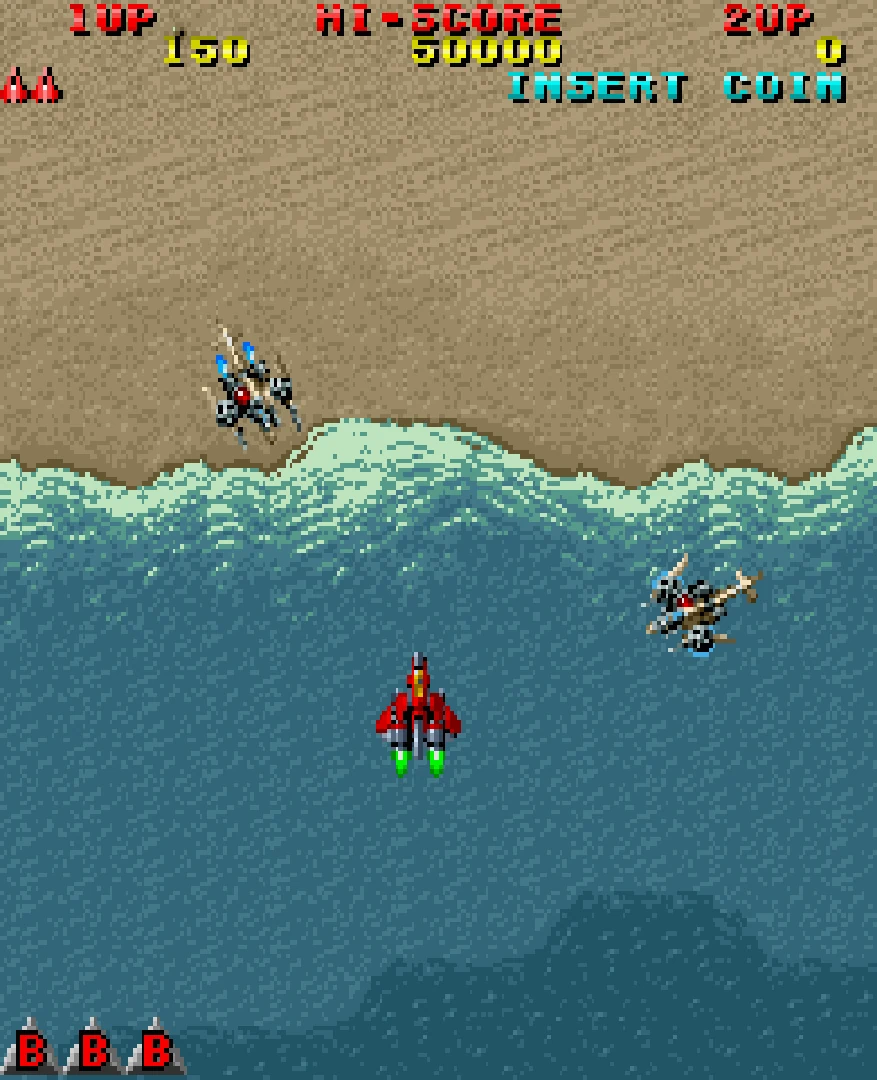 Capture verticale de Raiden Project : un chasseur rouge au-dessus de la mer, près d'une plage où passent deux appareils ennemis