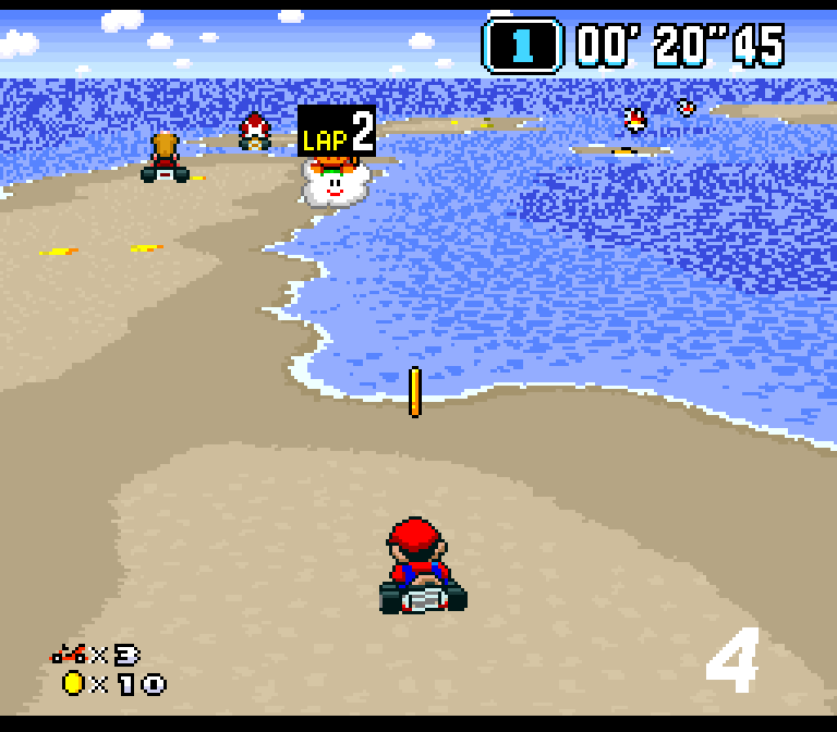 Capture du patch : Mario sur une piste de sable au bord de l'eau, en plein écran, le chronomètre en haut à droite