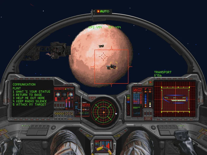 Capture de Wing Commander III : vue depuis le cockpit d'un chasseur, une planète rouge au centre, un réticule de visée et des écrans de bord