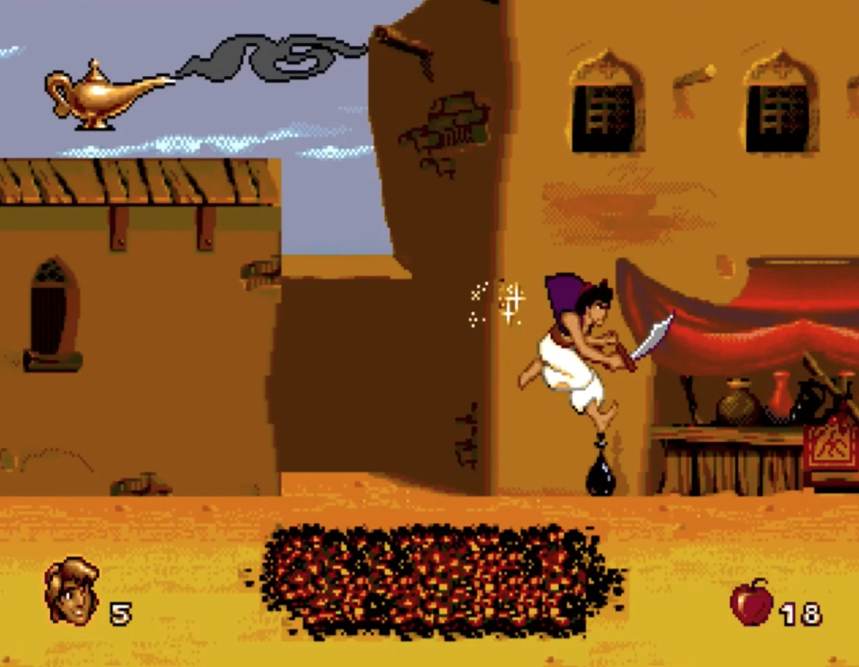 Aladdin sabre au clair devant un étal du marché d'Agrabah, sur Mega Drive