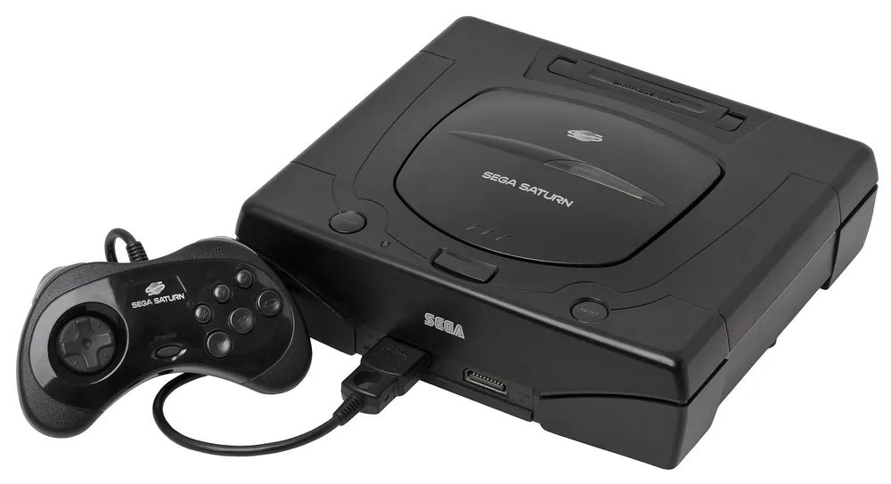 Saturn noire de seconde génération avec sa manette