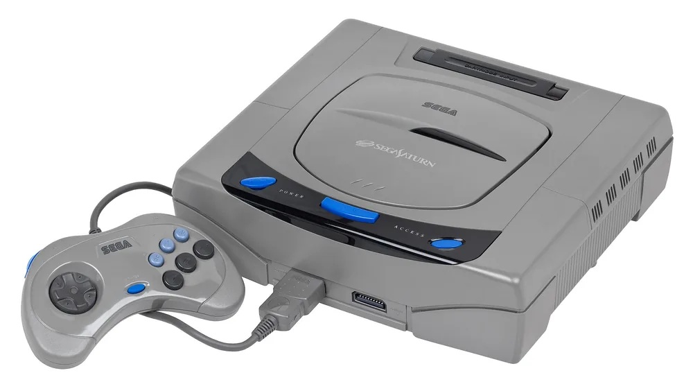 Saturn japonaise de première génération, grise, avec sa manette