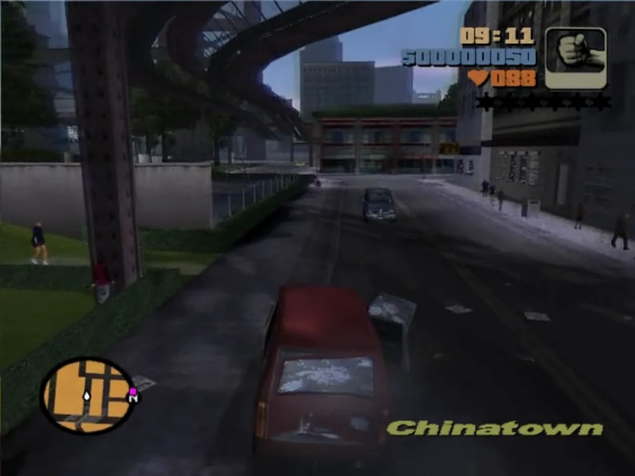 Une rue de Liberty City sous le métro aérien dans Grand Theft Auto III