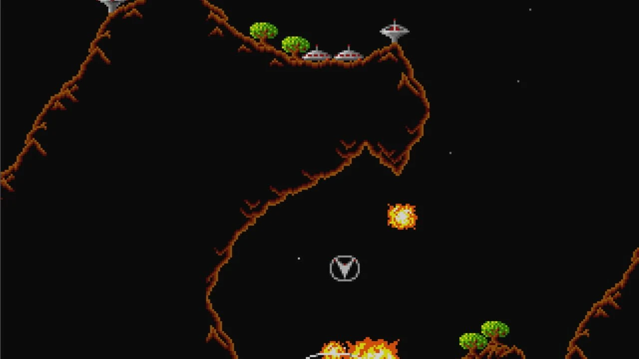 Capture d'écran du jeu Oids montrant une planète avec ses tourelles et un androïde à secourir