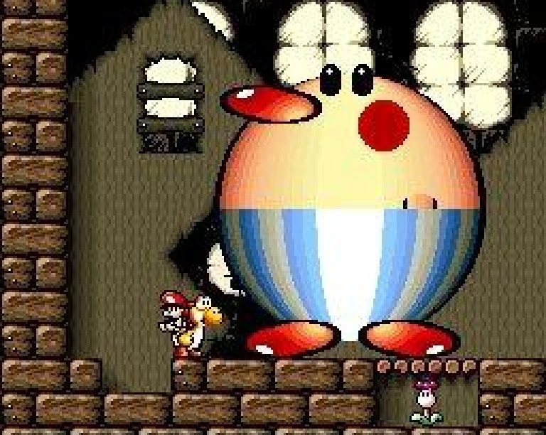 Capture de Super Mario World 2: Yoshi's Island sur Super Nintendo : Yoshi face à un boss géant, entre des murs de briques